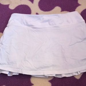 Ivivva white tennis skirt.